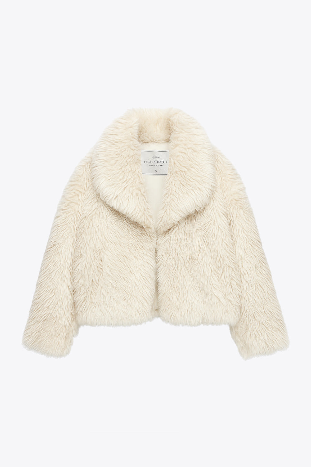 Abrigo corto de efecto pelo, fit oversized, con solapa y manga larga.