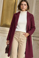 Abrigo textura botón