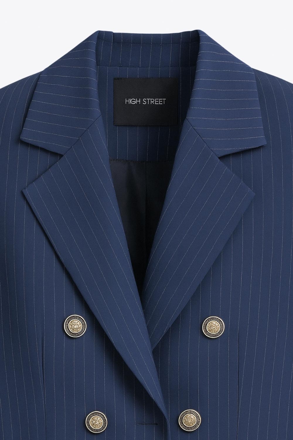 Blazer corto cruzado de fit ajustado, estampado rayas, manga larga, solapa, hombreras y cierre frontal con doble cruce de botones en contraste.