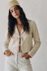 Short blouse with lapel neckline and ties