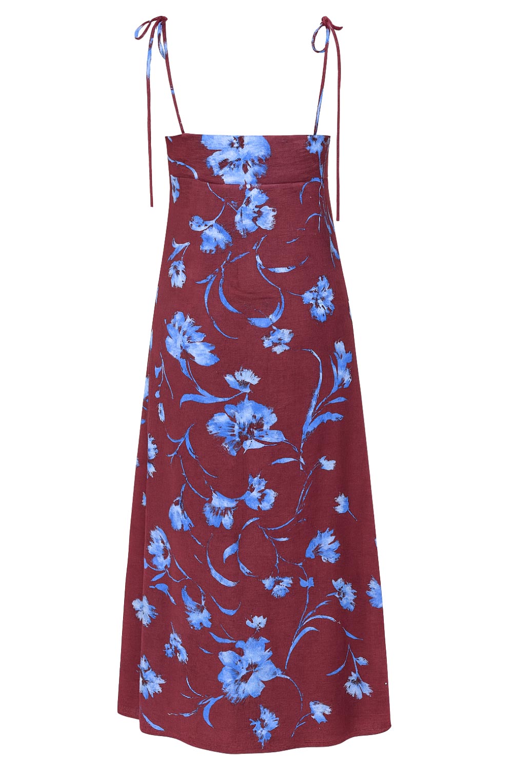 Blusa larga estampada, de fit fluido, tirantes delgados con nudo ajustable, escote v con cortes, abertura frontal y cierre con botón.