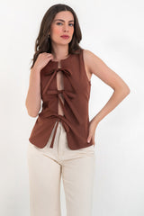 Blusa sin mangas con lazos frontales