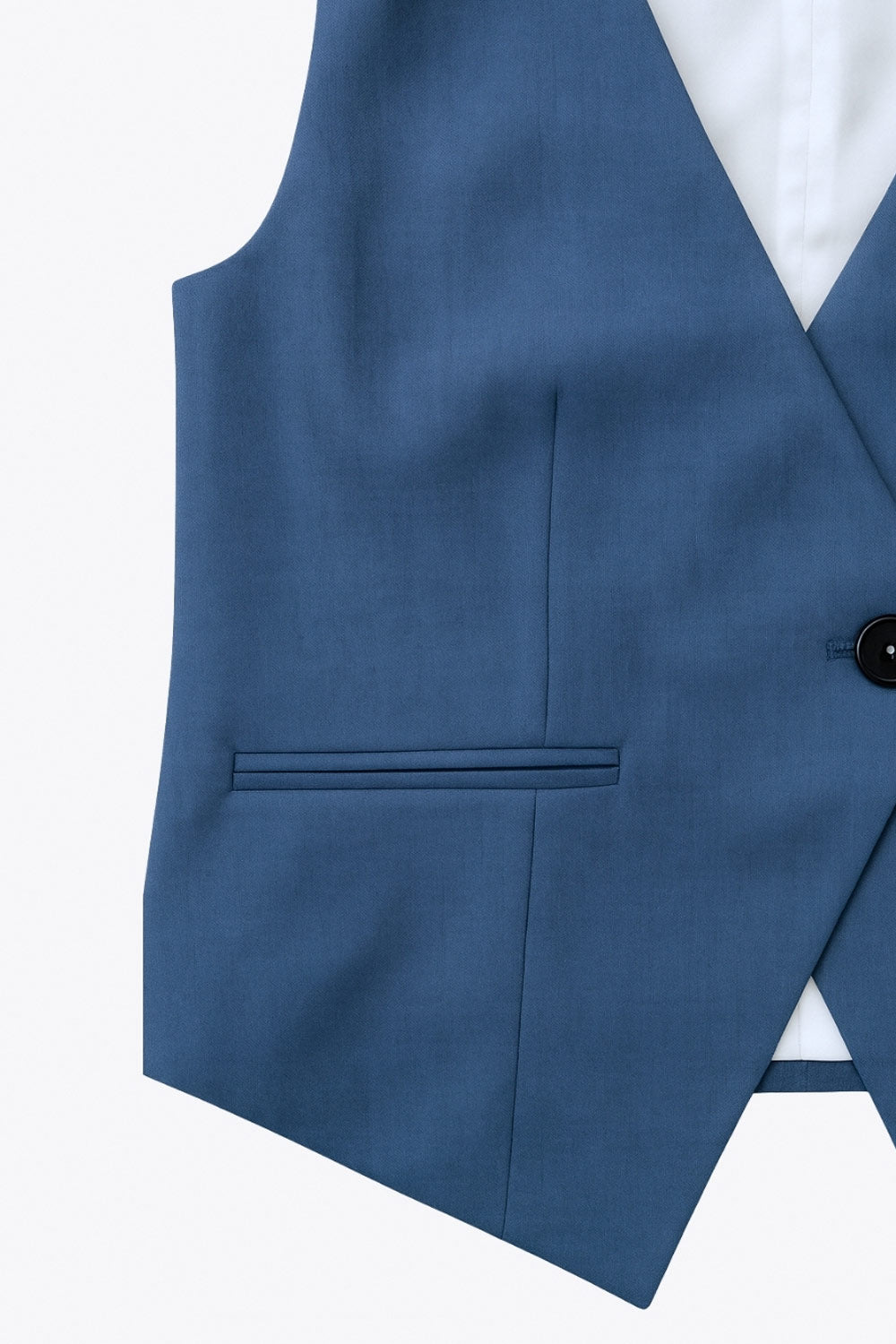 Chaleco asimétrico de fit ajustado, escote v, vivos decorativos frontales y cierre frontal con botón en contraste y bajo asimétrico.