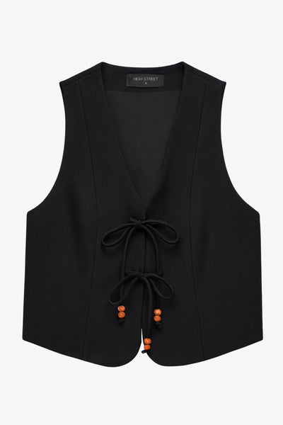 Chaleco de fit recto, pinzas frontales, escote v redondeado y cierre frontal de lazos amarrables con detalle en contraste.