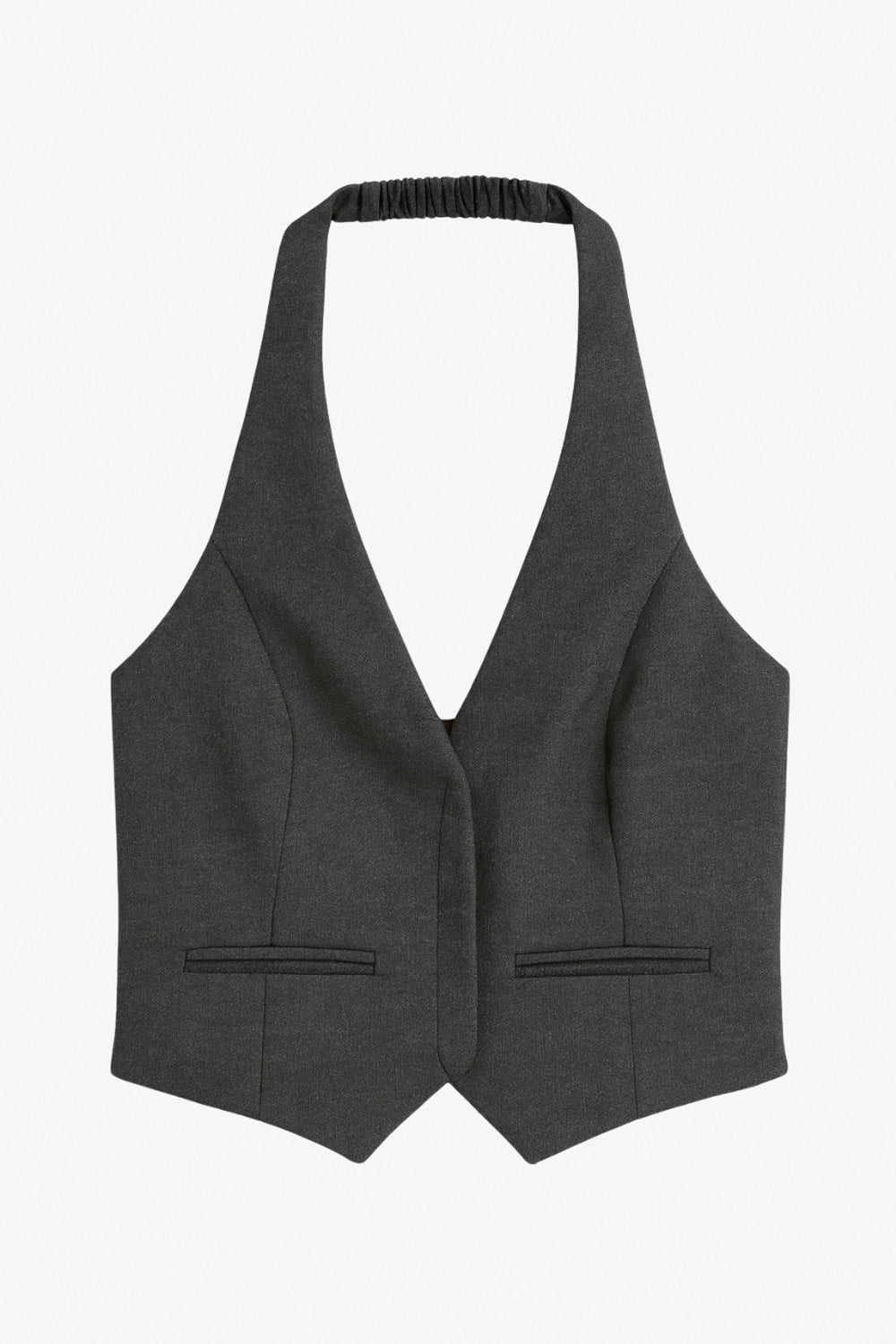 Chaleco corto cuello halter, fit ajustado, escote v, cierre frontal con hilera oculta de botones, vivos decorativos frontales y bajo v frontal. Escote en espalda y detalle de trabilla ajustable posterior.