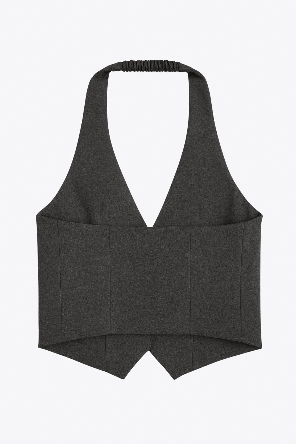 Chaleco corto cuello halter, fit ajustado, escote v, cierre frontal con hilera oculta de botones, vivos decorativos frontales y bajo v frontal. Escote en espalda y detalle de trabilla ajustable posterior.