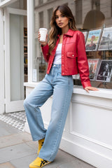 Chamarra efecto piel botones