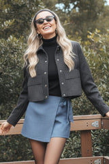 Falda short corte a con lazo lateral