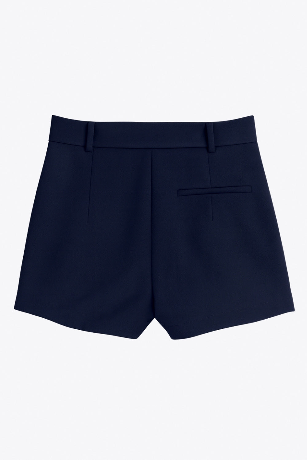 Falda short corto tableado de cintura alta con pretina y trabillas, corte en a, pinzas frontales y vivo decorativo posterior. Cierre frontal con broche y cremallera ocultos.