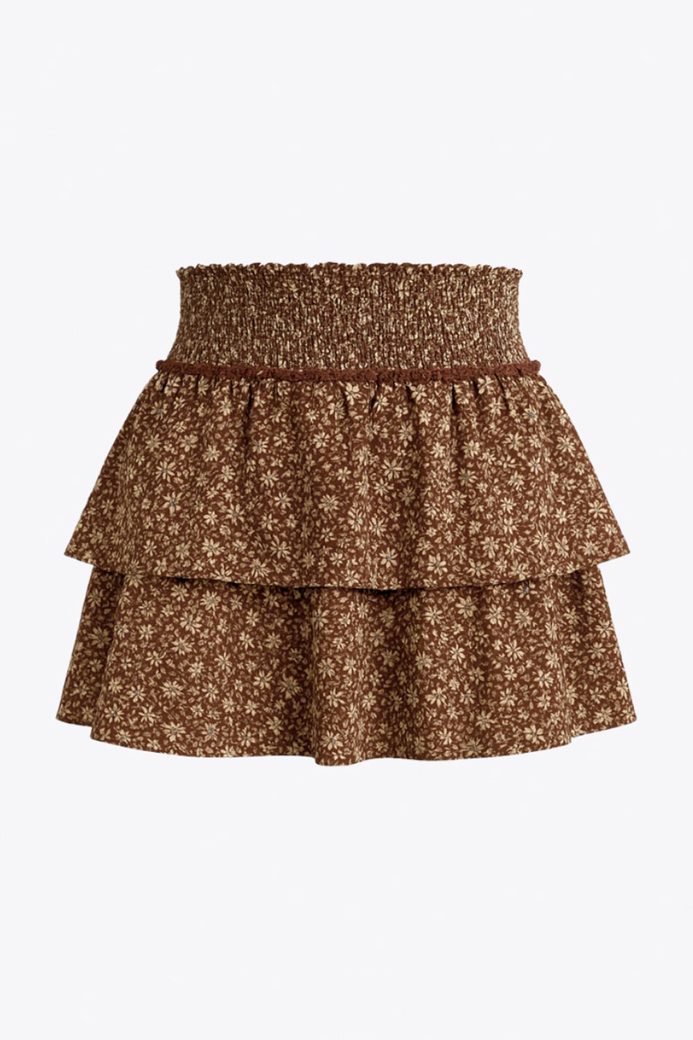 Falda short corto de estampado floral, cintura alta con pretina fruncida, rib rizado en borde, corte en a y capas de olanes en bajo.