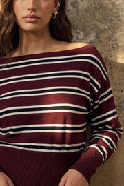 Jersey de estampado rayas, fit fluido, cuello barco, manga larga abullonada, rib en bajo y puños.