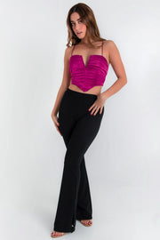 Legging ajustado de cintura alta, pretina elástica ancha, fit palazzo y detalle de aberturas laterales en bajo.