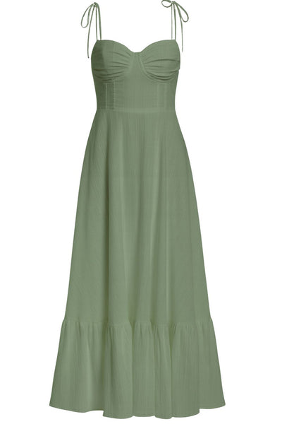 Maxi vestido de corte en a, tirantes delgados con nudo amarrables, escote corazón con cortes y detalles plisados. Cierre posterior con cremallera visible en contraste y olanes en borde de bajo.