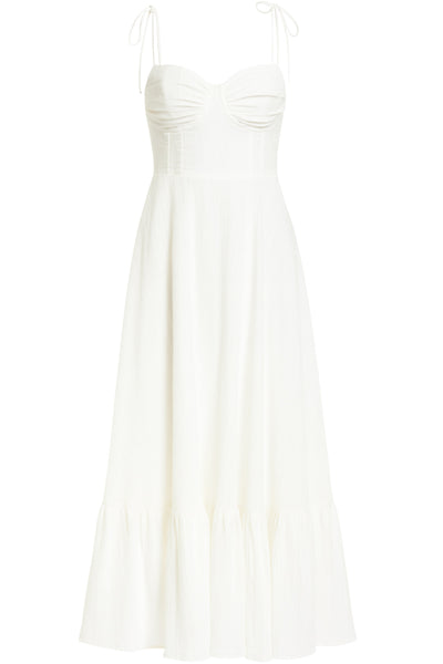 Maxi vestido de corte en a, tirantes delgados con nudo amarrables, escote corazón con cortes y detalles plisados. Cierre posterior con cremallera visible en contraste y olanes en borde de bajo.