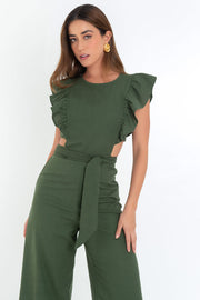 Palazzo de fit culotte, cintura con cut-out en costado, cuello redondo, sin mangas, detalle de olanes en hombros, lazo posterior amarrable en cintura y cierre posterior con cremallera visible en contraste.