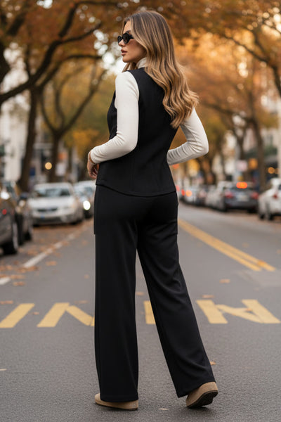 Pantalón básico de fit wide leg y cintura alta con pretina elástica.