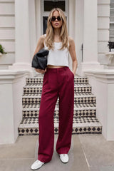 High-waisted wide-leg pleated trousers