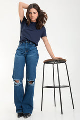 Pantalón denim wide leg con rotos