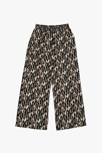 Pantalón estampado de fit fluido, bolsillos delanteros y cintura alta elástica.