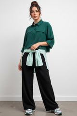 Pantalón fluido cintura alta wide leg con pinzas