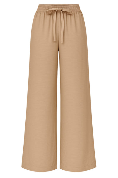 Pantalón fluido de fit recto, cintura alta elástica con jareta frontal ajustable y bolsillos delanteros.