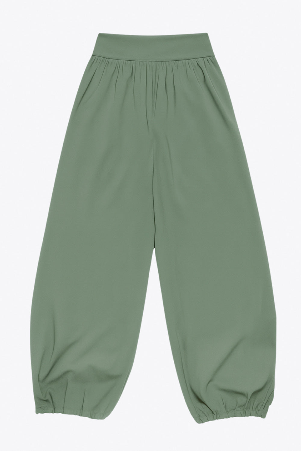 Pantalón de fit harem, cintura alta, peto con corte v frontal y plisado decorativos, rib elástico en bajo y cierre lateral con cremallera oculta.