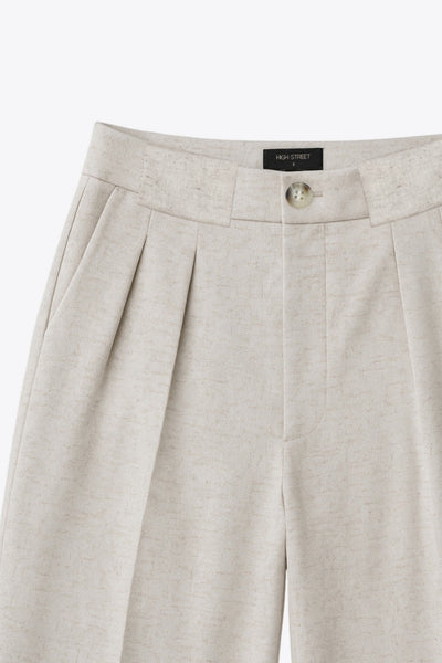 Pantalón de lino, fit wide leg, cintura alta con pretina y trabillas, pinzas frontales, bolsillos delanteros, detalle de raya frontal y posterior . Cierre frontal con botón y cremallera oculta.