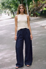 Wide-leg pleated trousers