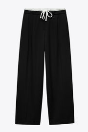 Pantalón de fit recto, pinzas frontales, cintura alta con pretina, detalle interior tipo boxer en contraste, jareta frontal ajustable, bolsillos frontales, vivo decorativo posterior y cierre lateral con cremallera oculta.