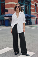 Pantalón wide leg con pinzas frontales tiro alto