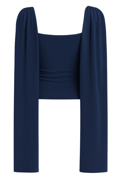 Top de fit ajustado, sin mangas, cuello redondo y detalle decorativo frontal con plisados en hombros.