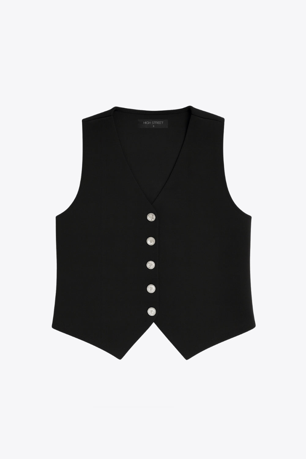 Chaleco de punto, fit recto, escote v y cierre frontal con hilera de botones en contraste. Detalle de bajo v frontal.