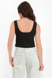 Top corto canalé básico de fit recto, sin mangas y escote redondo.