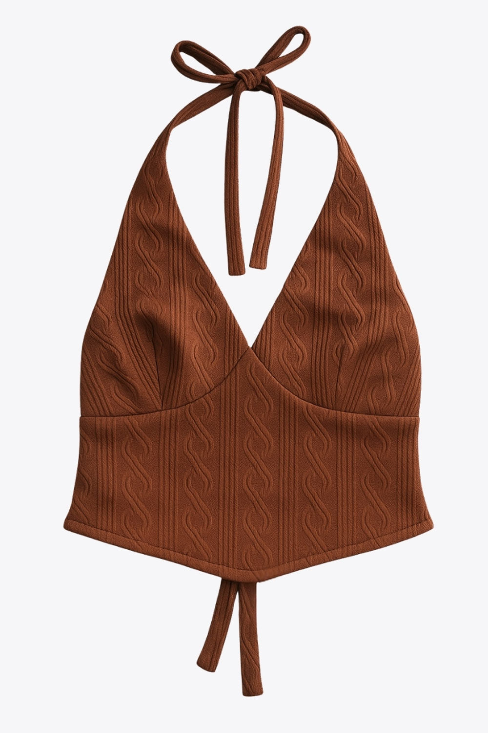 Top corto de cuello halter, lazo amarrable posterior, escote v con cortes frontales, bajo v frontal, escote en espalda y lazo amarrable posterior. Detalle de textura en tejido.