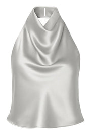 Top corto halter de cuello alto fluido, fit recto, escote en espalda, cierre posterior con botón y ojal.