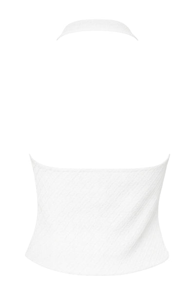 Top corto de cuello halter con escote v y cortes frontales, fit ajustado, escote en espalda y detalle de textura en tejido.