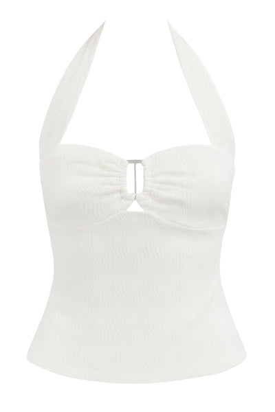 Top de fit ajustado, cuello halter con nudo amarrable posterior, escote corazón con cortes, plisados decorativos y cut out frontal. Detalle de textura en tejido.