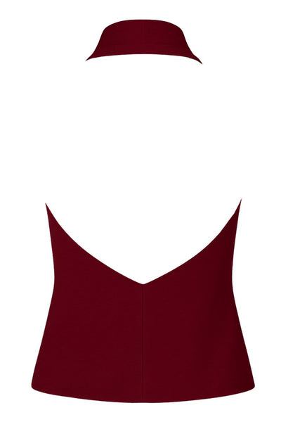 Top de cuello halter con escote fluido, fit recto, sin mangas y escote en espalda.