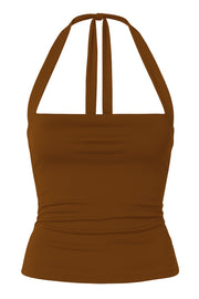 Top de fit ajustado, escote recto y cuello halter con nudo amarrable posterior.