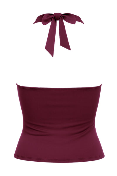 Top corto halter de fit ajustado, escote v cruzado con cortes, plisados decorativos y lazo amarrable posterior.