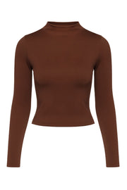 Top básico de canalé, fit ajustado, cuello mock seguido y manga larga.