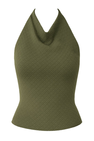 Top corto halter de fit ajustado, cuello fluido, sin mangas, elástico posterior y escote en espalda. Detalle de textura en tejido.