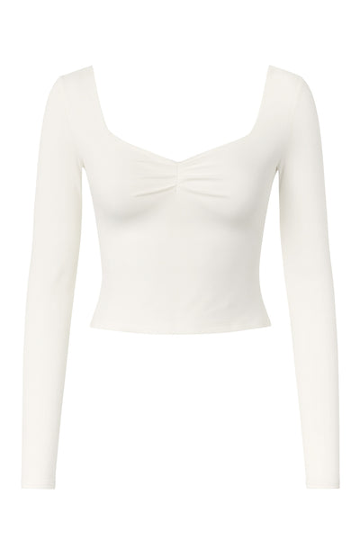 Top corto de fit ajustado, manga larga y cuello cuadrado con plisado frontal.