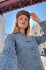 Long-sleeve button-up blouse
