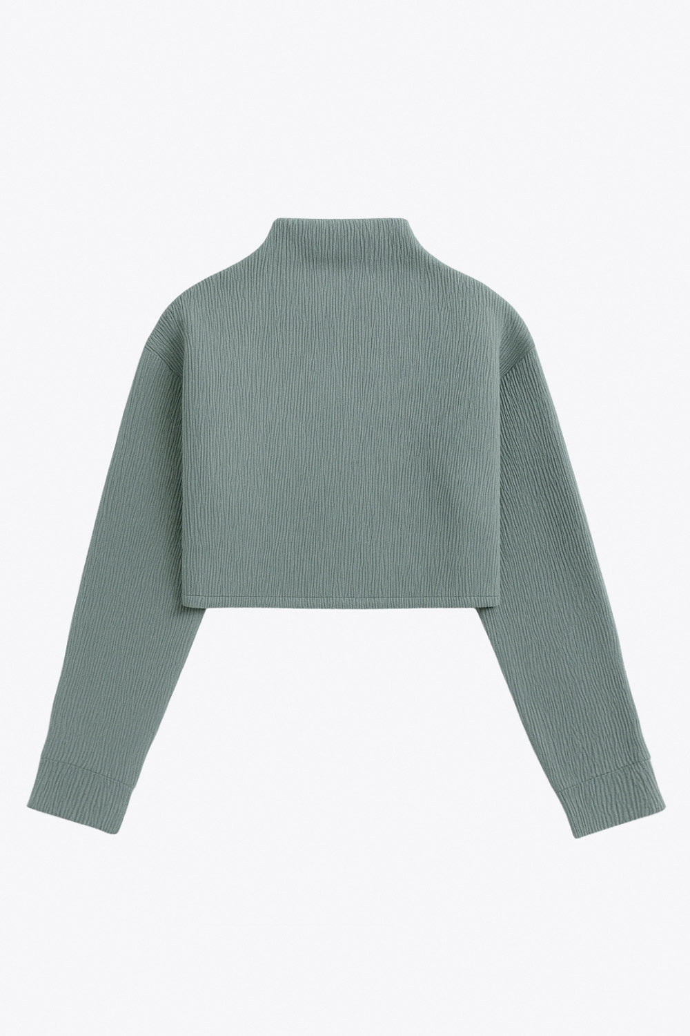 Top de manga larga con hombro caído, cuello mock seguido, fit recto y textura en tejido.