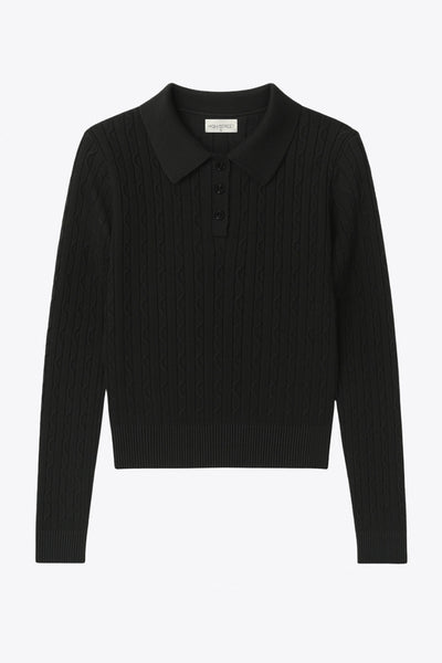 Top canalé de punto, fit ajustado, manga larga, cuello polo con botones, rib en bajo y puños. y escote v con cuello polo. Detalle de textura en tejido.