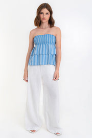 Top strapless de lino, fit ajustado, escote recto con fruncido y peplum con capas de olanes en bajo.