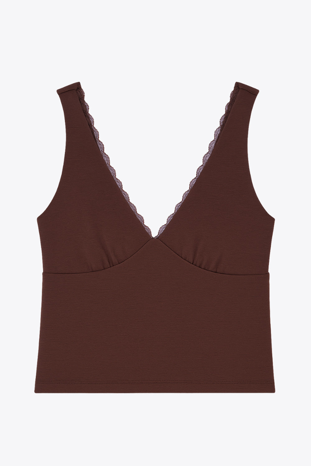 Top de fit ajustado, escote v con encaje en bordes, cortes frontales decorativos con plisados, sin mangas y detalle de textura en tejido.