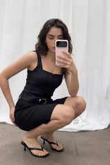 Top tirantes botones enfrente