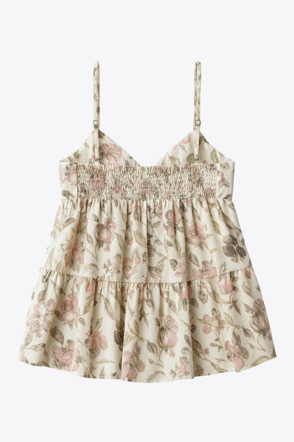 Top de tirantes delgados ajustables, estampado floral, corte en a, capas con olanes en bajo, escote v redondeado con plisados y cut out, abertura frontal y cierre con lazos amarrables. Detalle de fruncido en espalda y detalle decorativo en lazos.